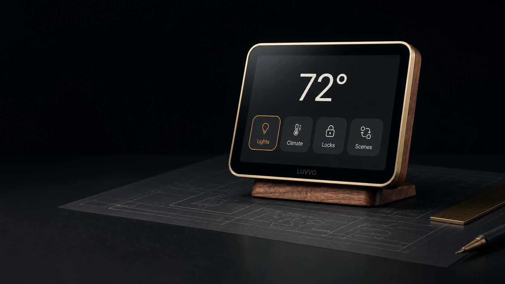 Luvvo Home Controller staged on a dark workbench beside technical drawings